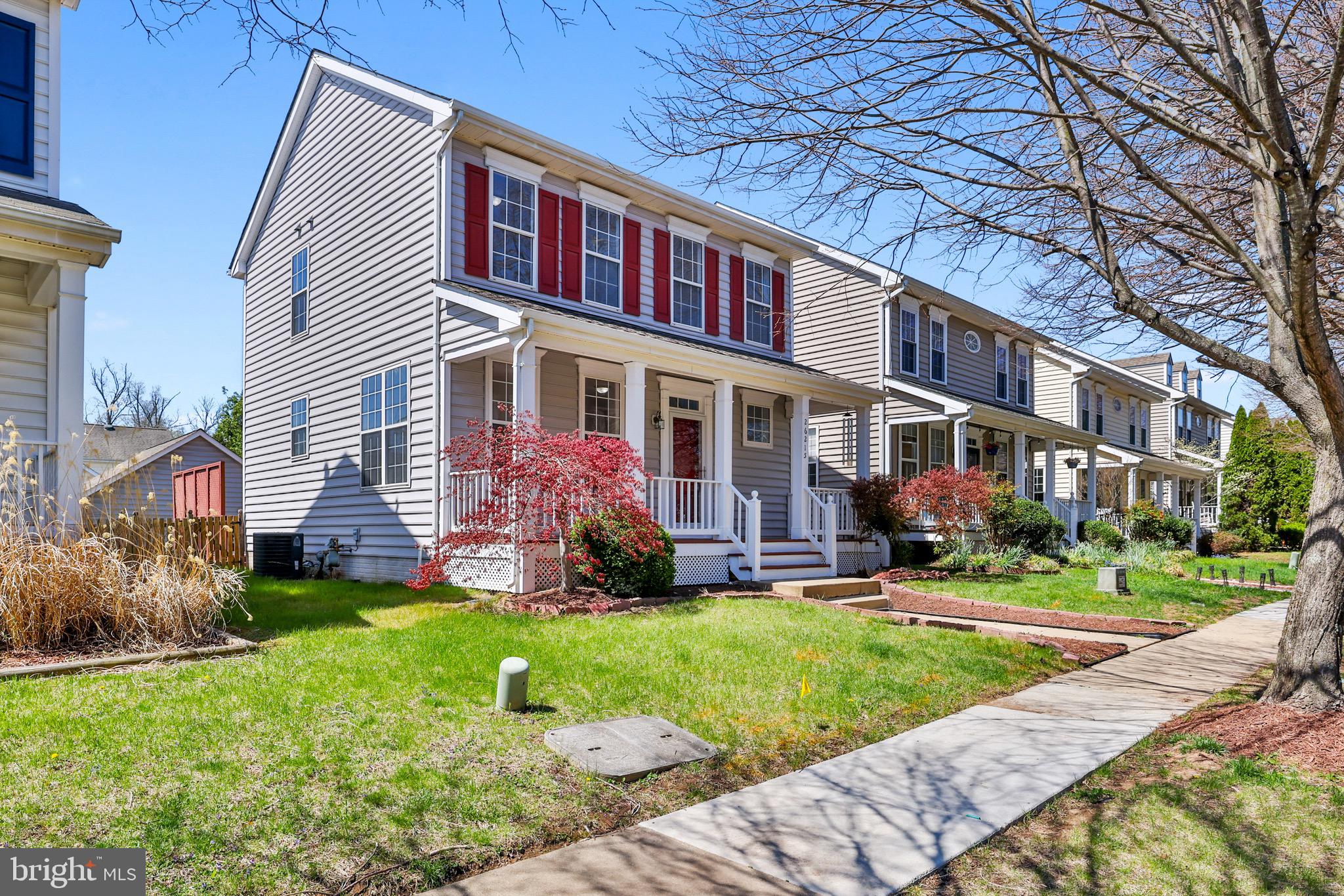 26215 Ocala Circle Chantilly, VA 20152 - Photo 4 of 50 a front view of house with yard and green space