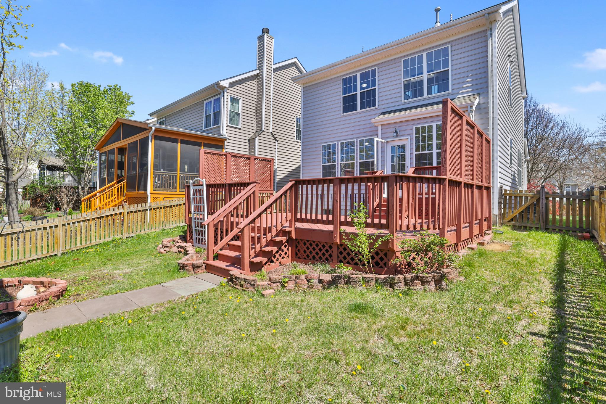 26215 Ocala Circle Chantilly, VA 20152 - Photo 45 of 50 a view of a house with a yard