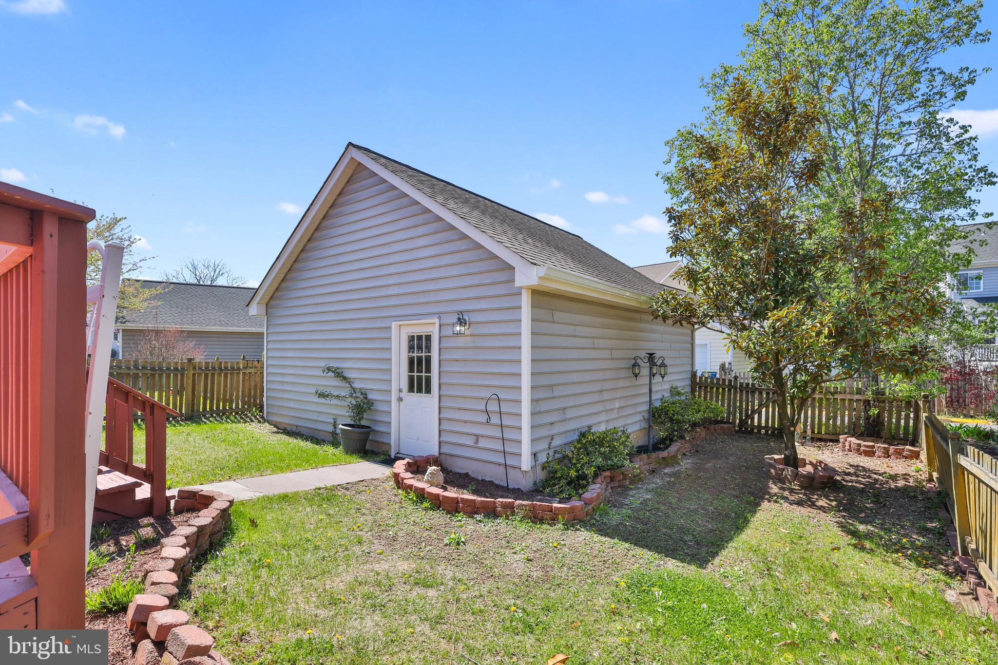 26215 Ocala Circle Chantilly, VA 20152 - Photo 46 of 50 a view of backyard with a garden and entertaining space