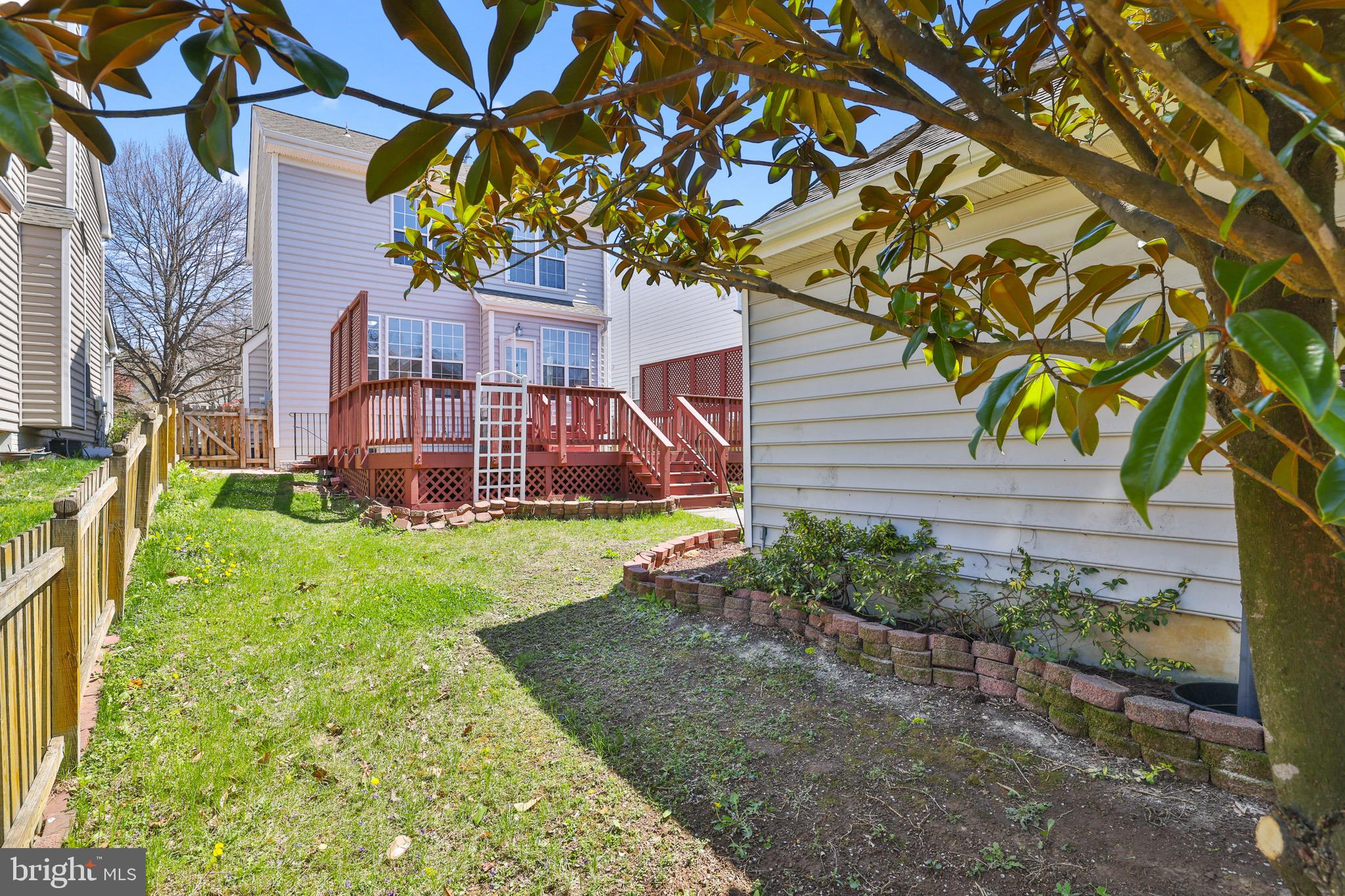 26215 Ocala Circle Chantilly, VA 20152 - Photo 47 of 50 a view of a house with a yard