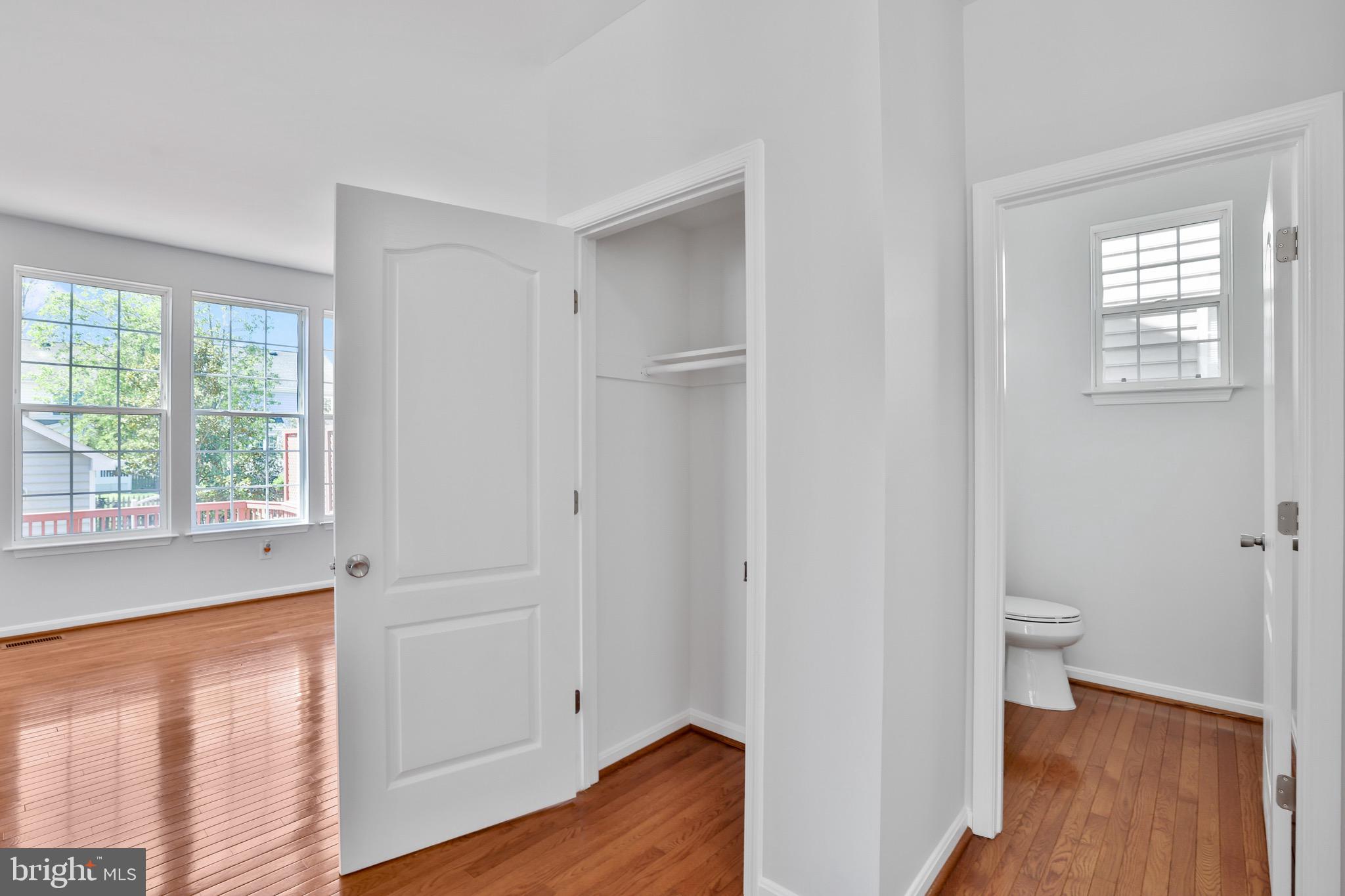 26215 Ocala Circle Chantilly, VA 20152 - Photo 9 of 50 a view of room with window and wooden floor