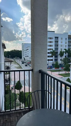 a view of a balcony with city view