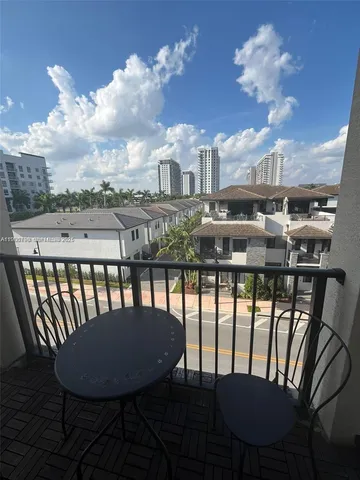 a view of a city from a dining room