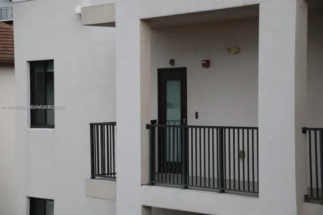 a view of a hallway with entryway