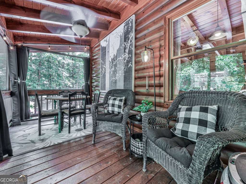 34 Amber Way, Unit 1 Morganton, GA 30560 - Photo 27 of 39 a living room with furniture and a large window