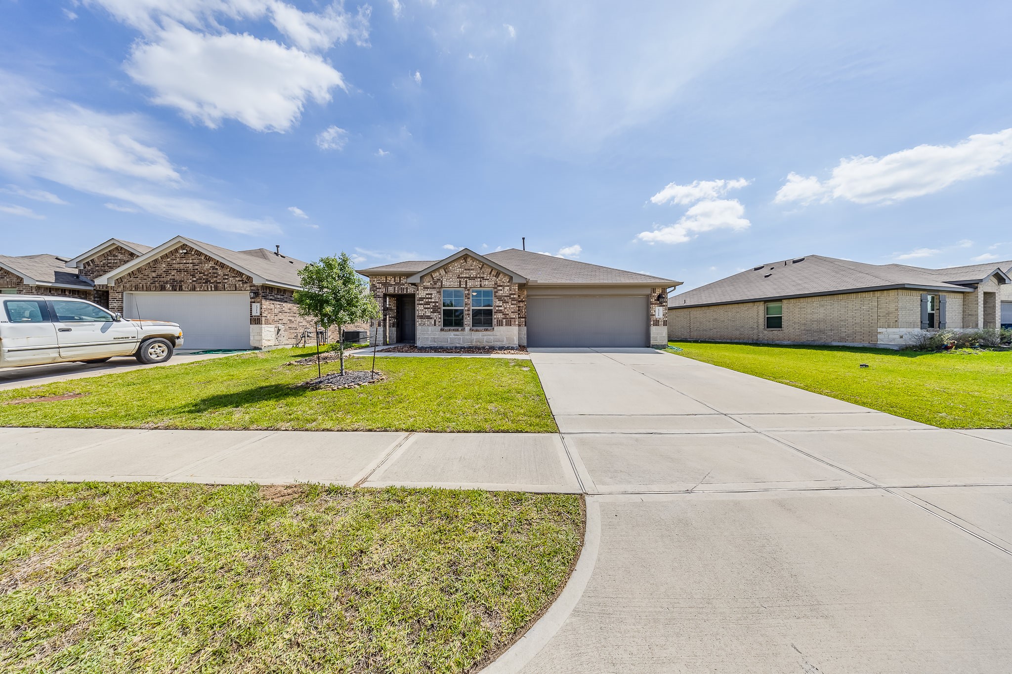 23210 Barberry Crk Trail Spring, TX 77373 - Photo 25 of 33 a view of a house with swimming pool and a yard