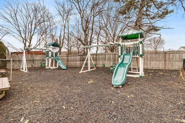 a view of a yard with a slide
