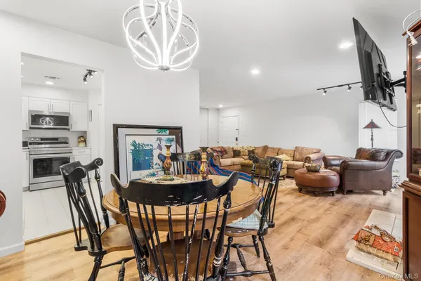 a view of a dining room with furniture