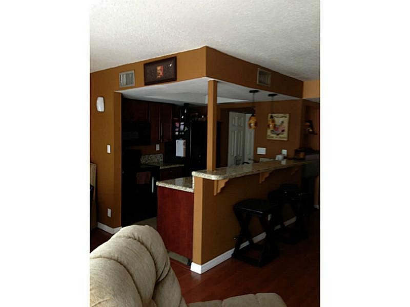 8801 West Sample Road, Unit 16 Coral Springs, FL 33065 - Photo 2 of 13 Kitchen