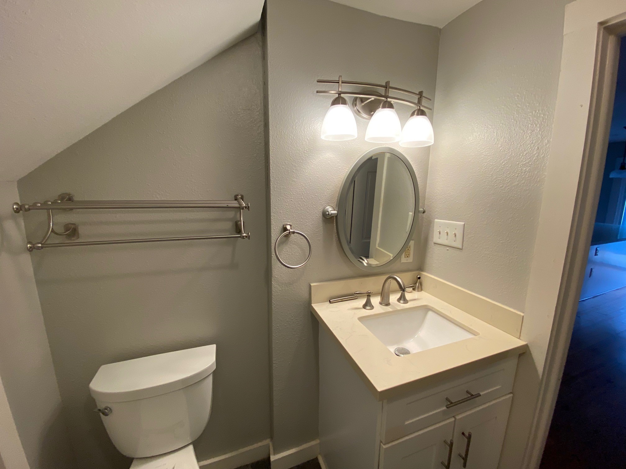3209 Milburn Street Houston, TX 77021 - Photo 21 of 45 a bathroom with a toilet sink and mirror