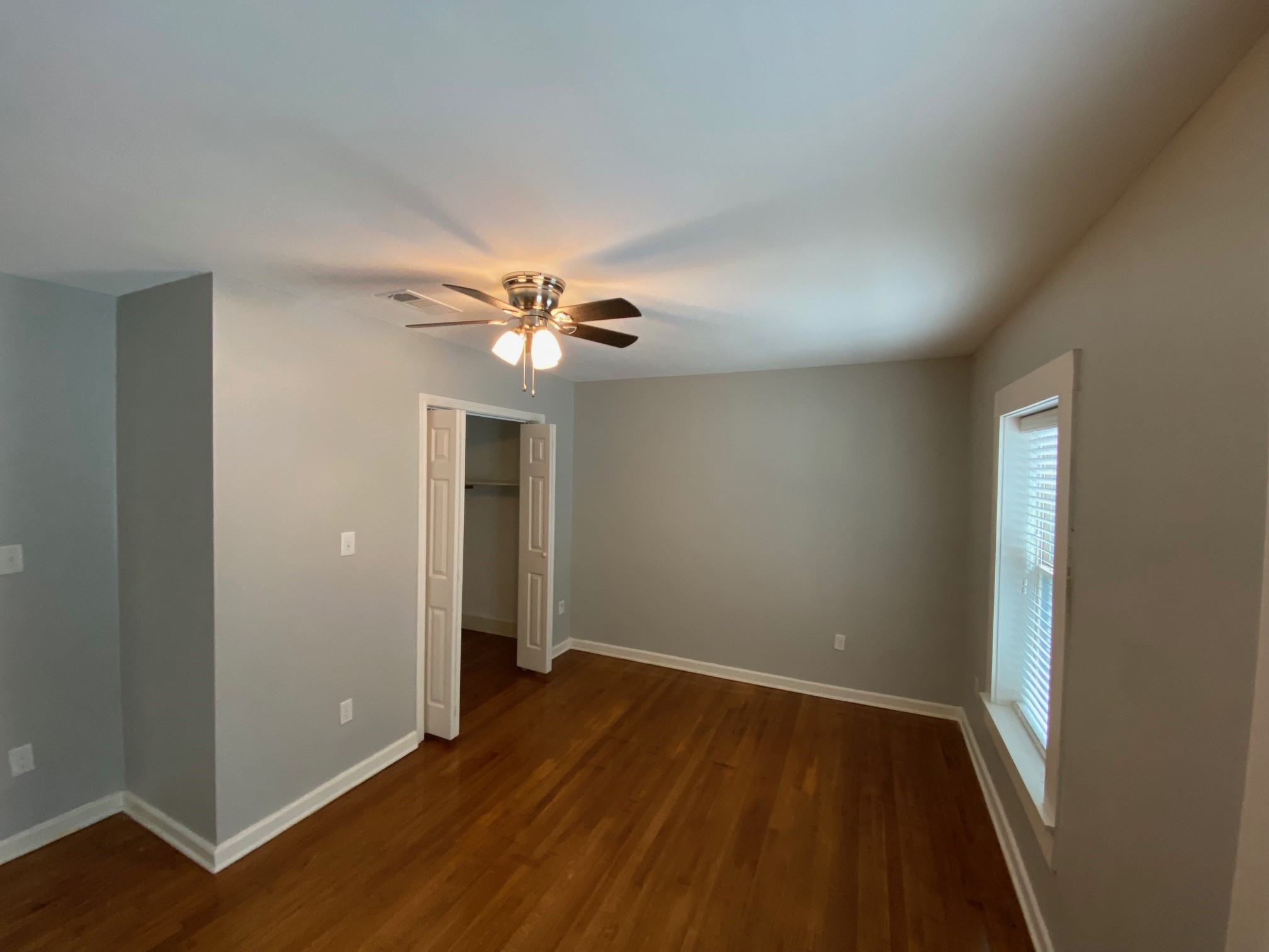 3209 Milburn Street Houston, TX 77021 - Photo 22 of 45 a view of an empty room with wooden floor