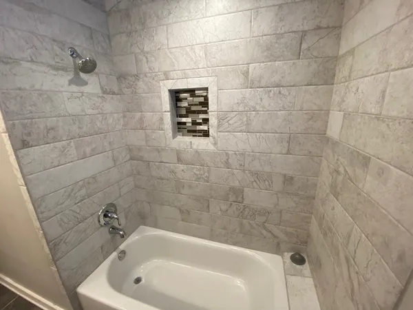 a bathroom with a bathtub