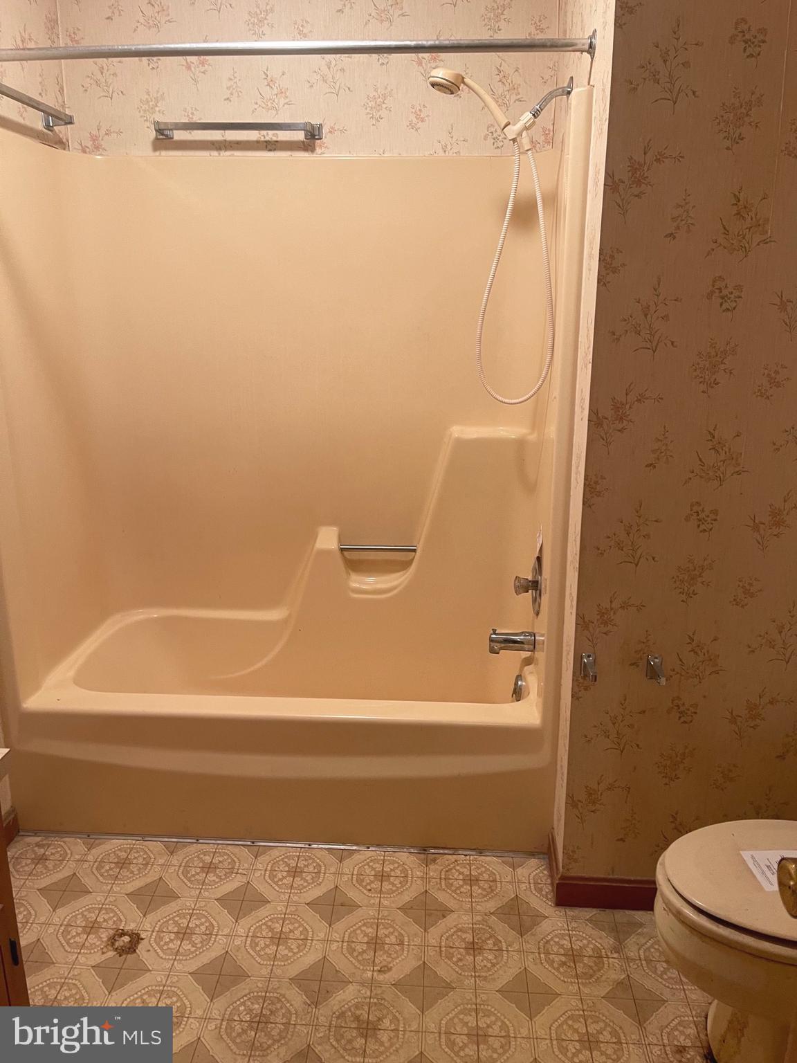 37339 Main Street Ocean View, DE 19970 - Photo 11 of 13 a bathroom with a shower and a toilet