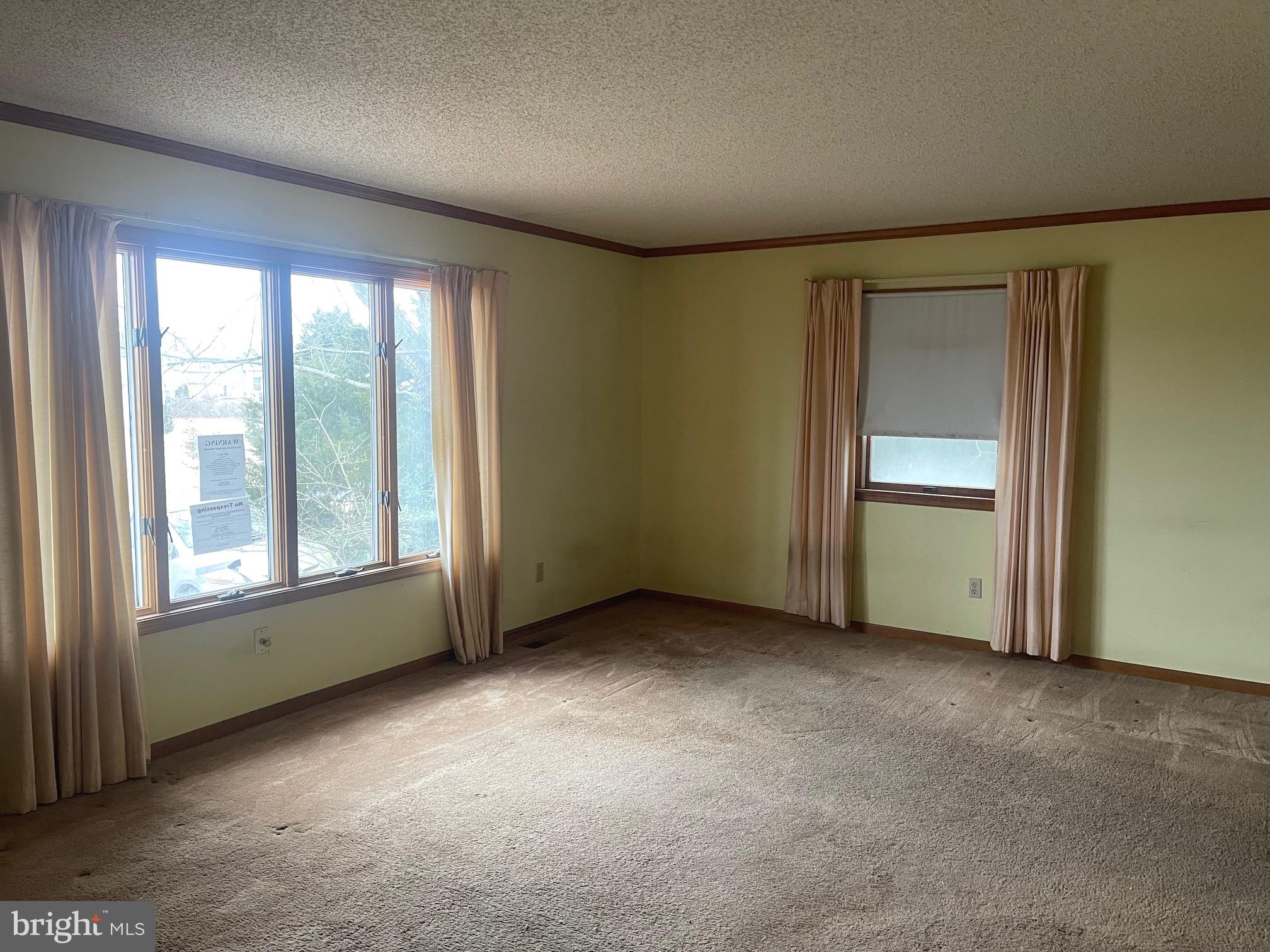 37339 Main Street Ocean View, DE 19970 - Photo 2 of 13 an empty room with a window