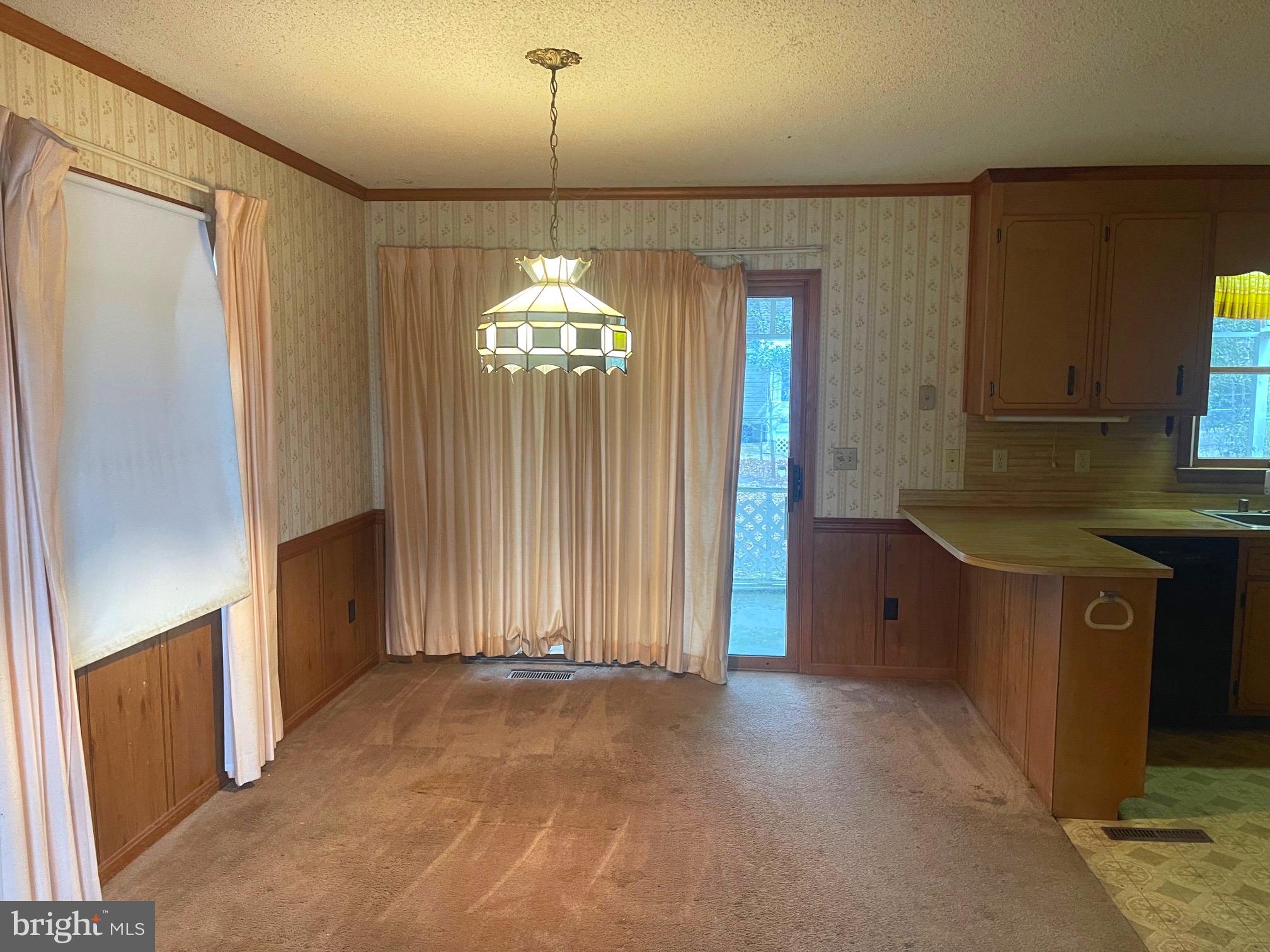 37339 Main Street Ocean View, DE 19970 - Photo 3 of 13 wooden floor in an empty room with a window