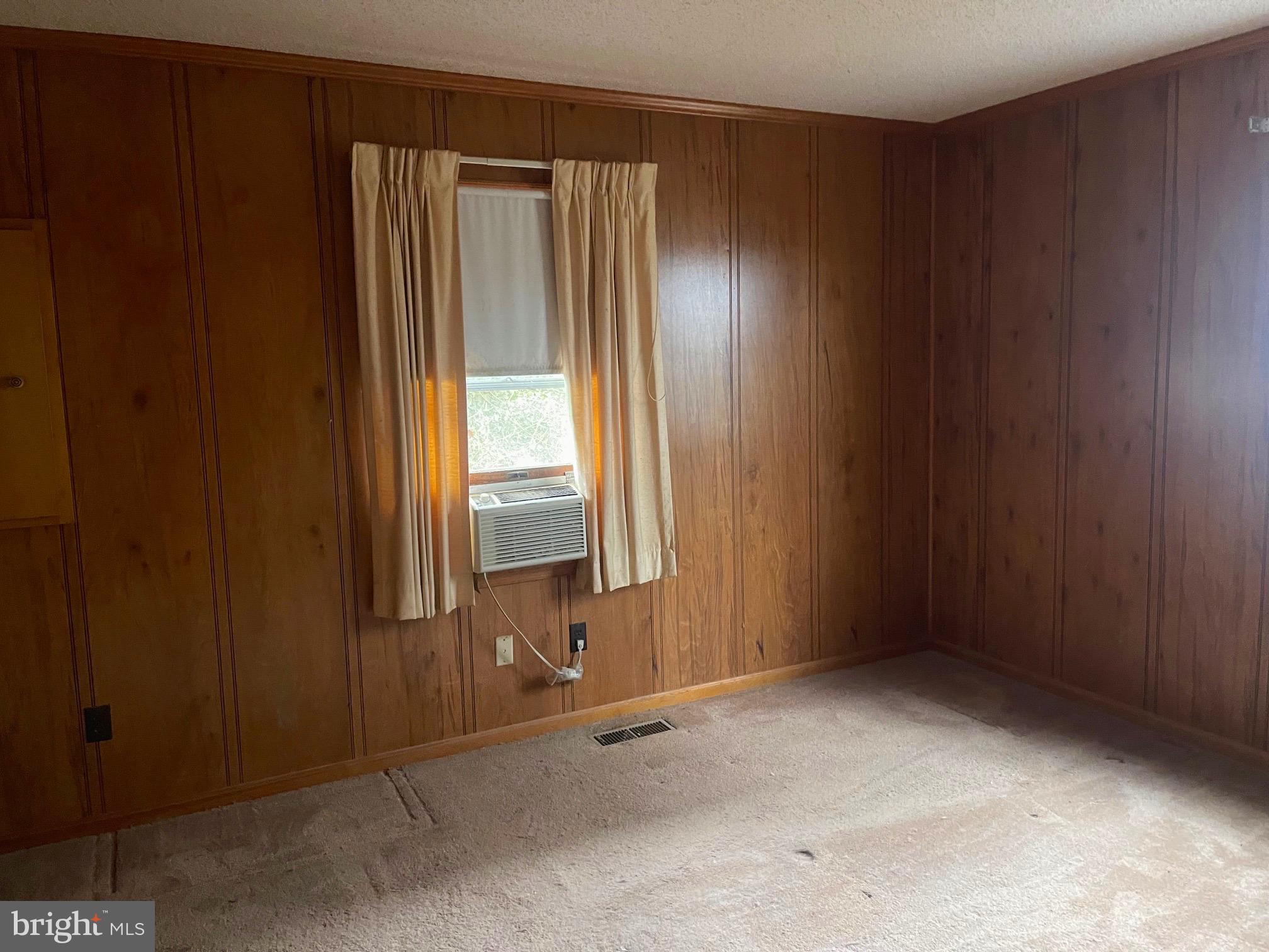 37339 Main Street Ocean View, DE 19970 - Photo 8 of 13 an empty room with a window