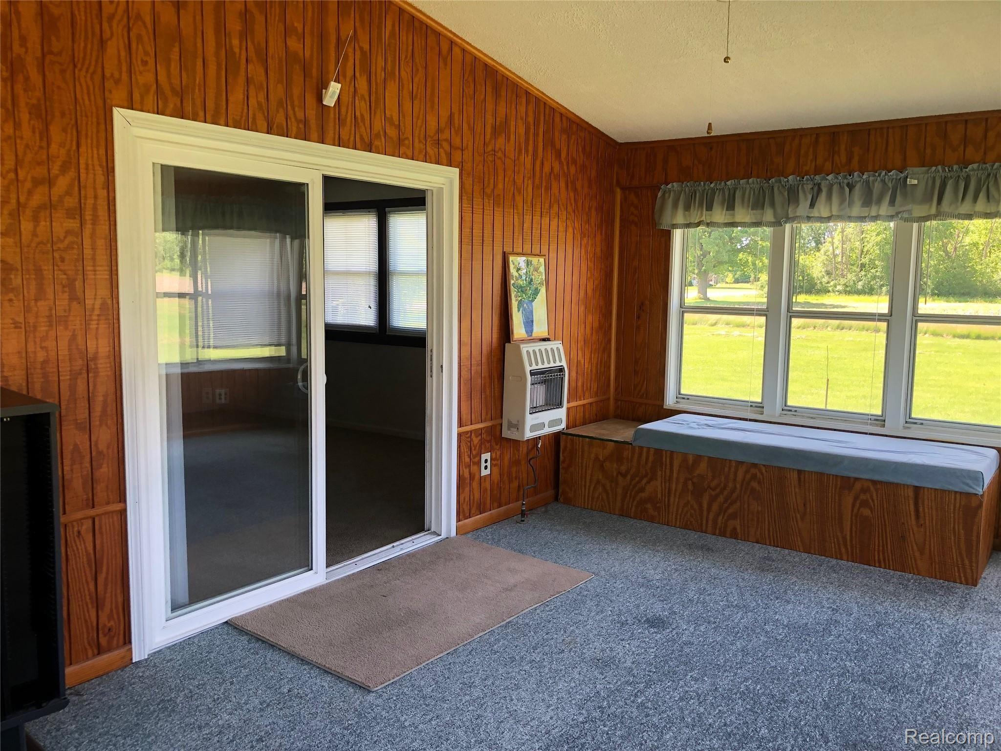3663 Kilgore Road Avoca, MI 48006 - Photo 22 of 57 Enjoy the sunroom in every season with the wall heating unit