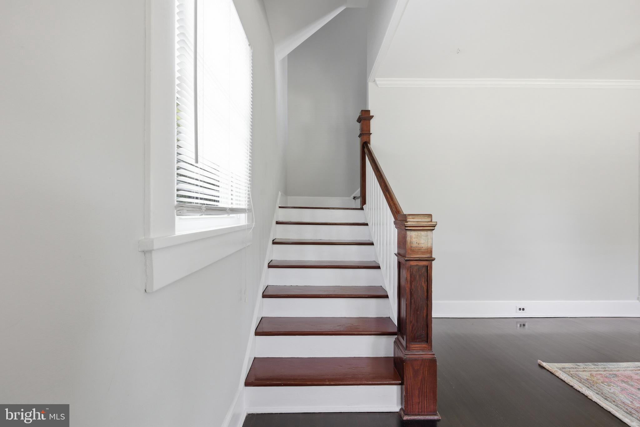 106 Main Street Preston, MD 21655 - Photo 6 of 31 a view of entryway with wooden floor and white walls