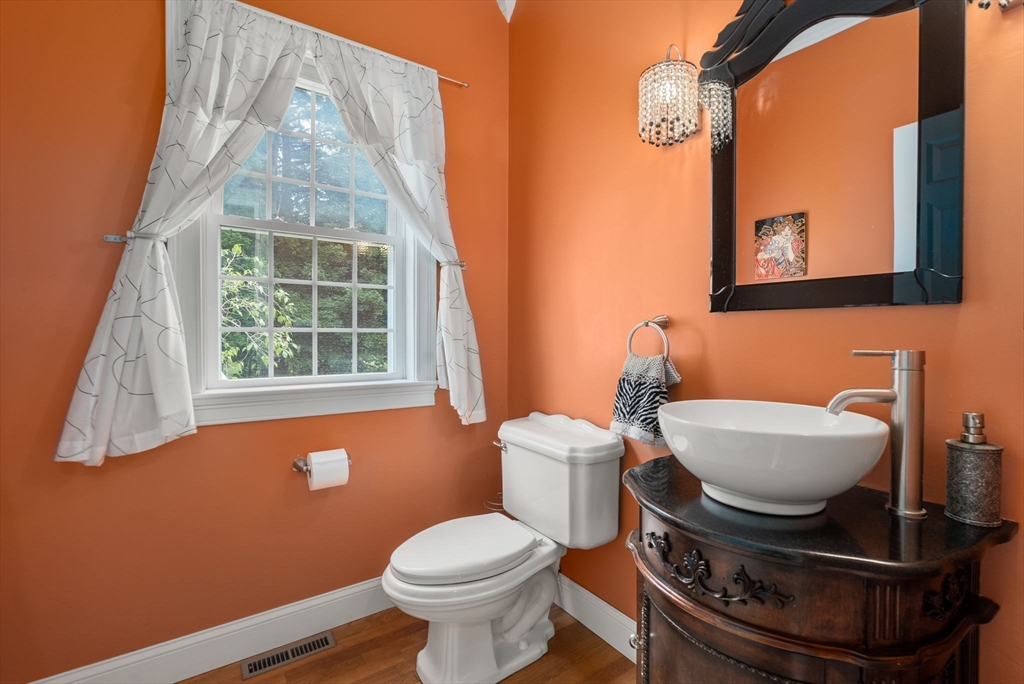 15 Beaver Brook Road Canton, MA 02021 - Photo 15 of 33 a bathroom with a toilet a sink and a window