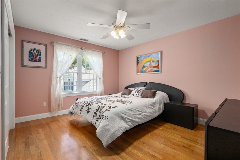15 Beaver Brook Road Canton, MA 02021 - Photo 20 of 33 a bedroom with a large bed and a window