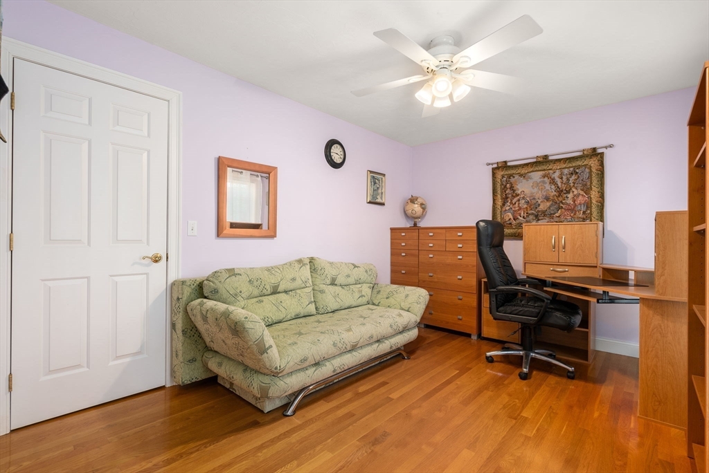 15 Beaver Brook Road Canton, MA 02021 - Photo 21 of 33 a living room with furniture and a wooden floor