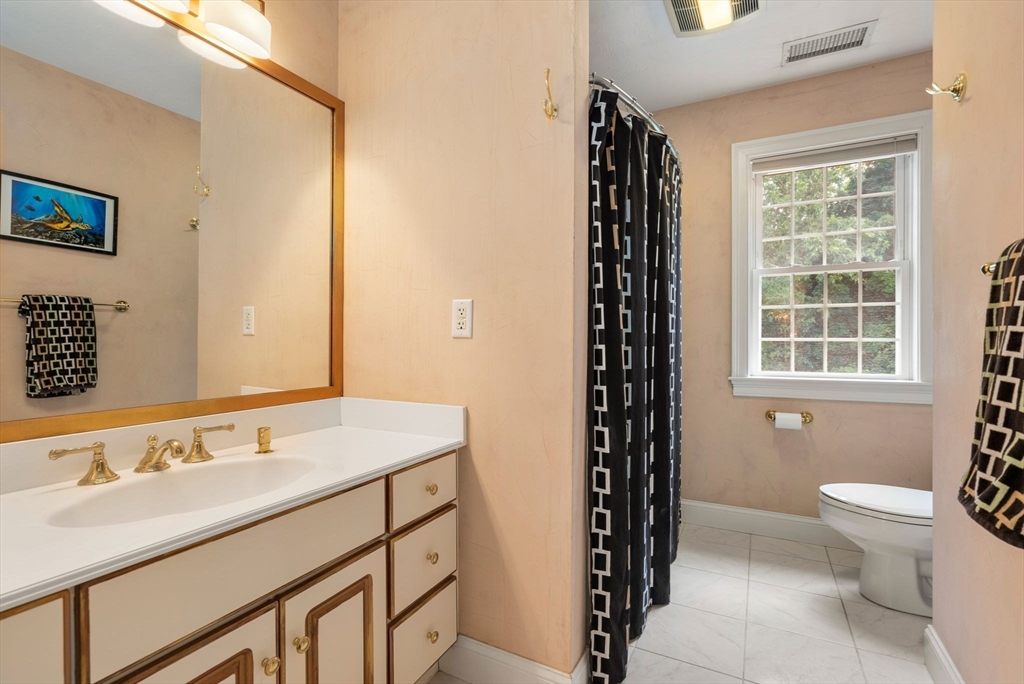 15 Beaver Brook Road Canton, MA 02021 - Photo 22 of 33 a bathroom with a sink a toilet and shower