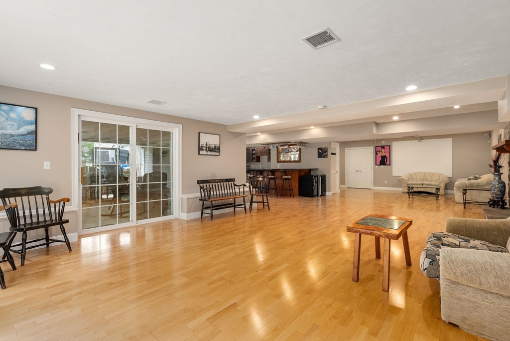 15 Beaver Brook Road Canton, MA 02021 - Photo 27 of 33 a living room with furniture and a table