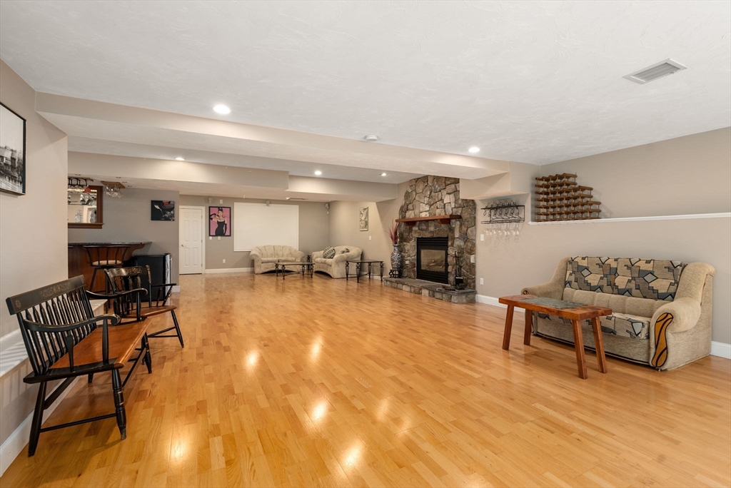 15 Beaver Brook Road Canton, MA 02021 - Photo 28 of 33 a living room with furniture and a wooden floor