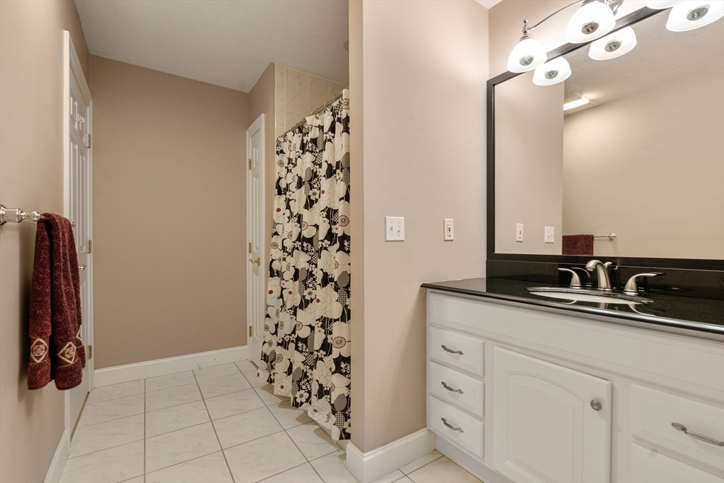 15 Beaver Brook Road Canton, MA 02021 - Photo 29 of 33 a bathroom with a sink and a mirror