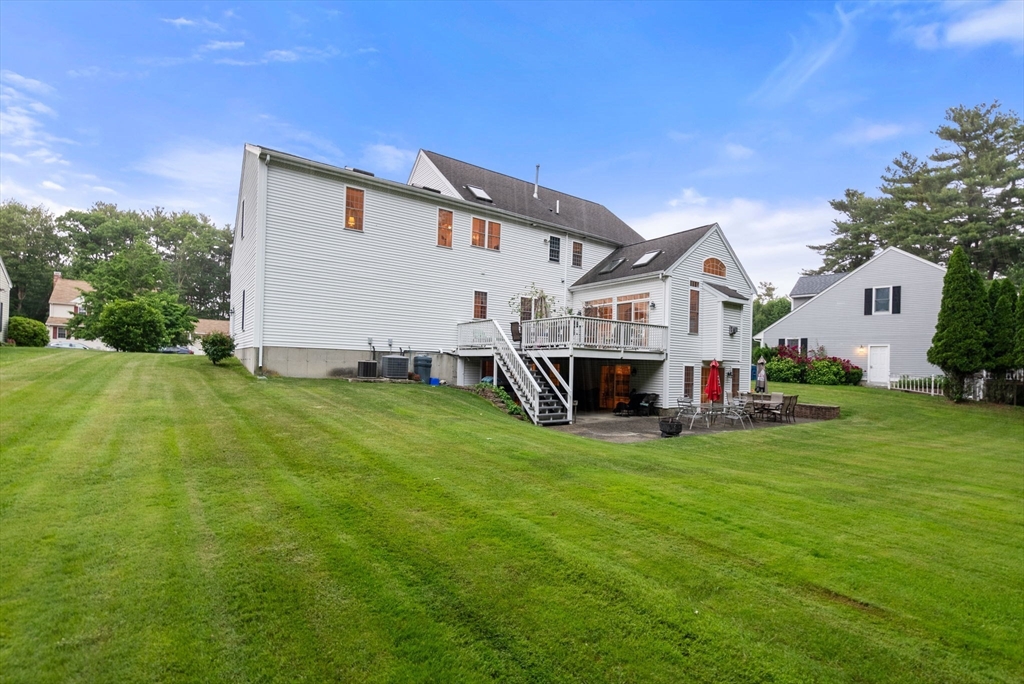 15 Beaver Brook Road Canton, MA 02021 - Photo 30 of 33 a view of a house with a yard and garage