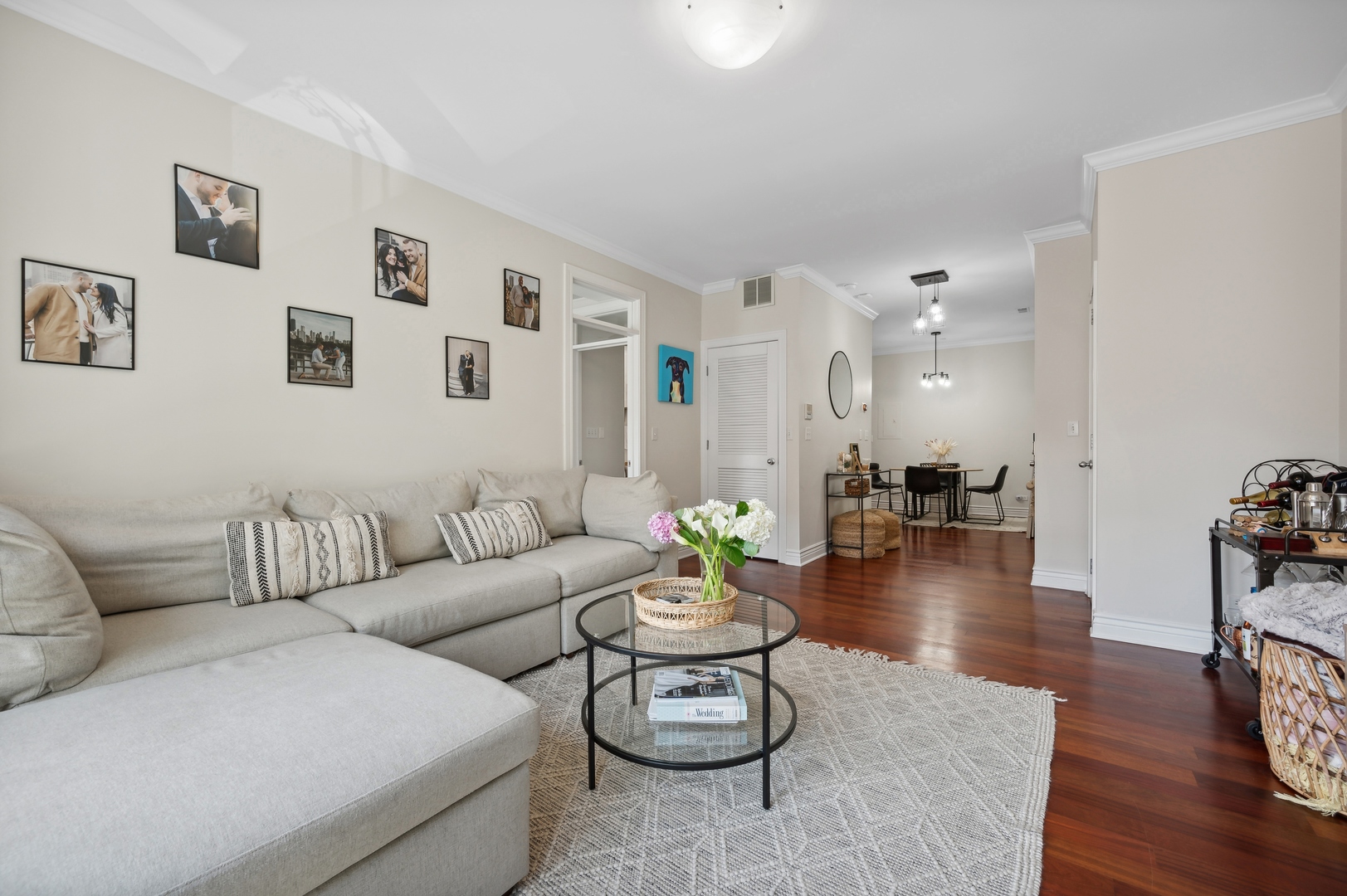 1610 West Byron Street, Unit 2 Chicago, IL 60613 - Photo 9 of 21 a living room with furniture and wooden floor