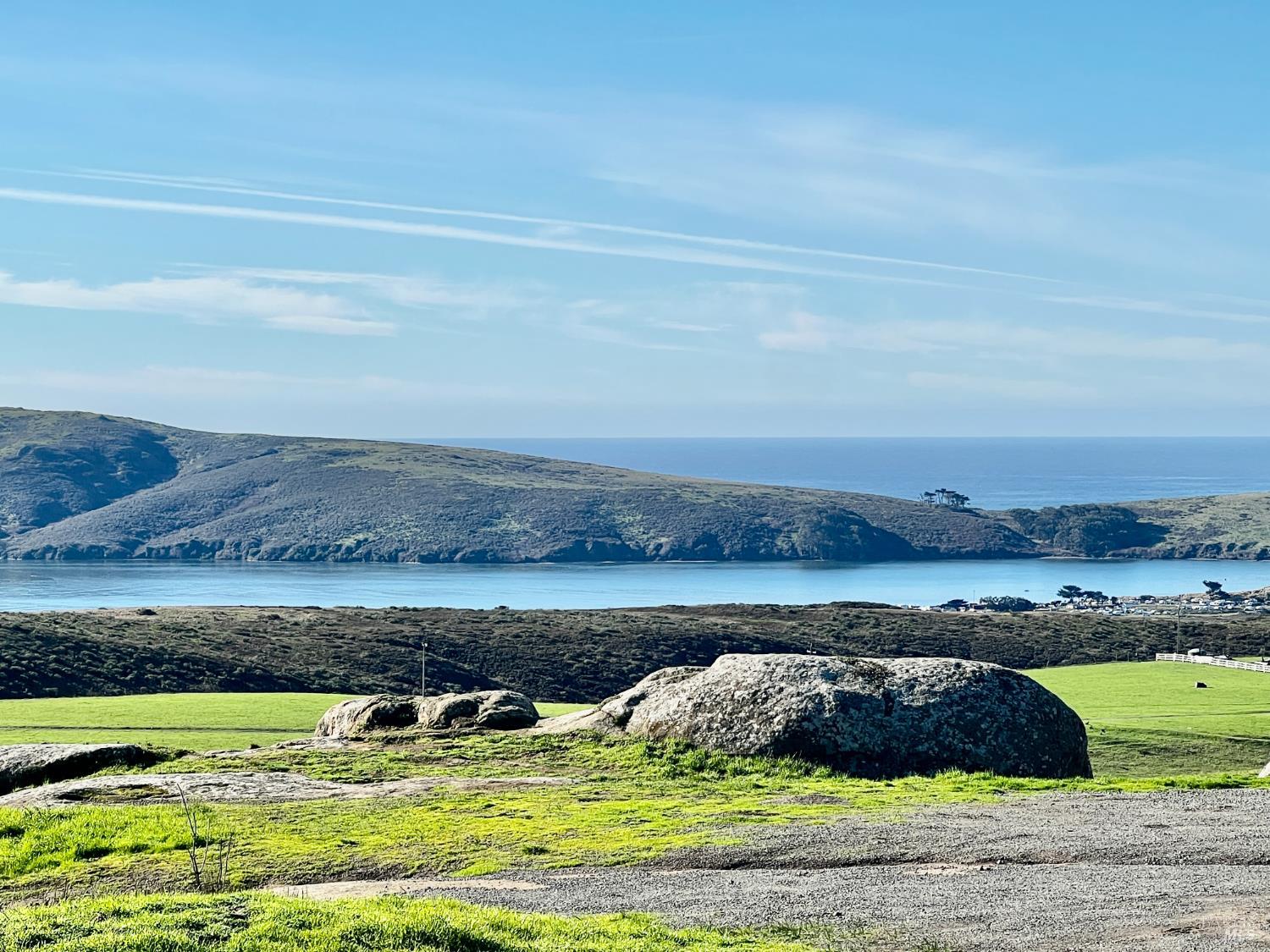 75 Ocean View Avenue Dillon Beach, CA 94929 - Photo 20 of 23 a view of a lake with houses in the back