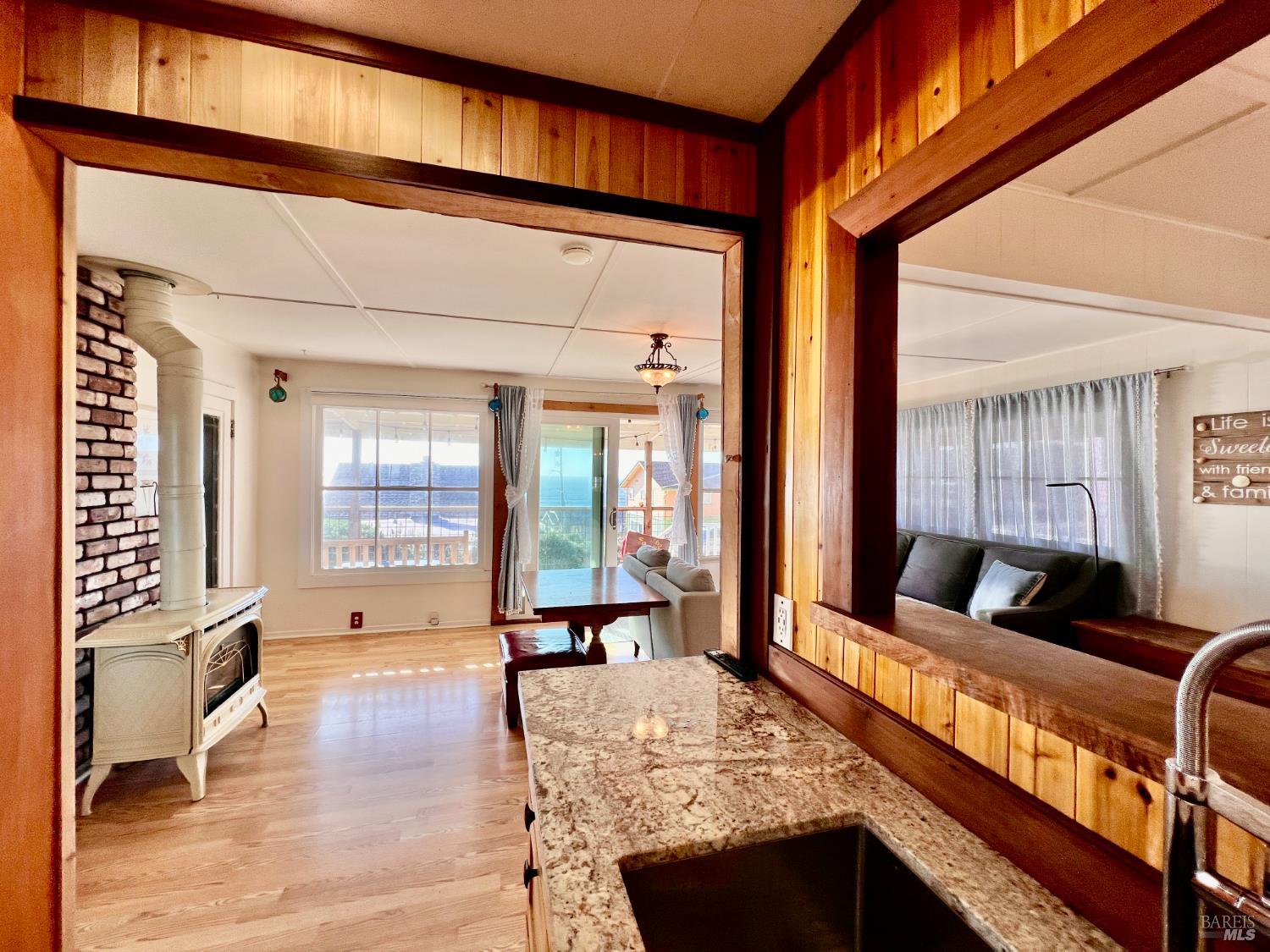 75 Ocean View Avenue Dillon Beach, CA 94929 - Photo 6 of 23 a living room with furniture window and wooden floor