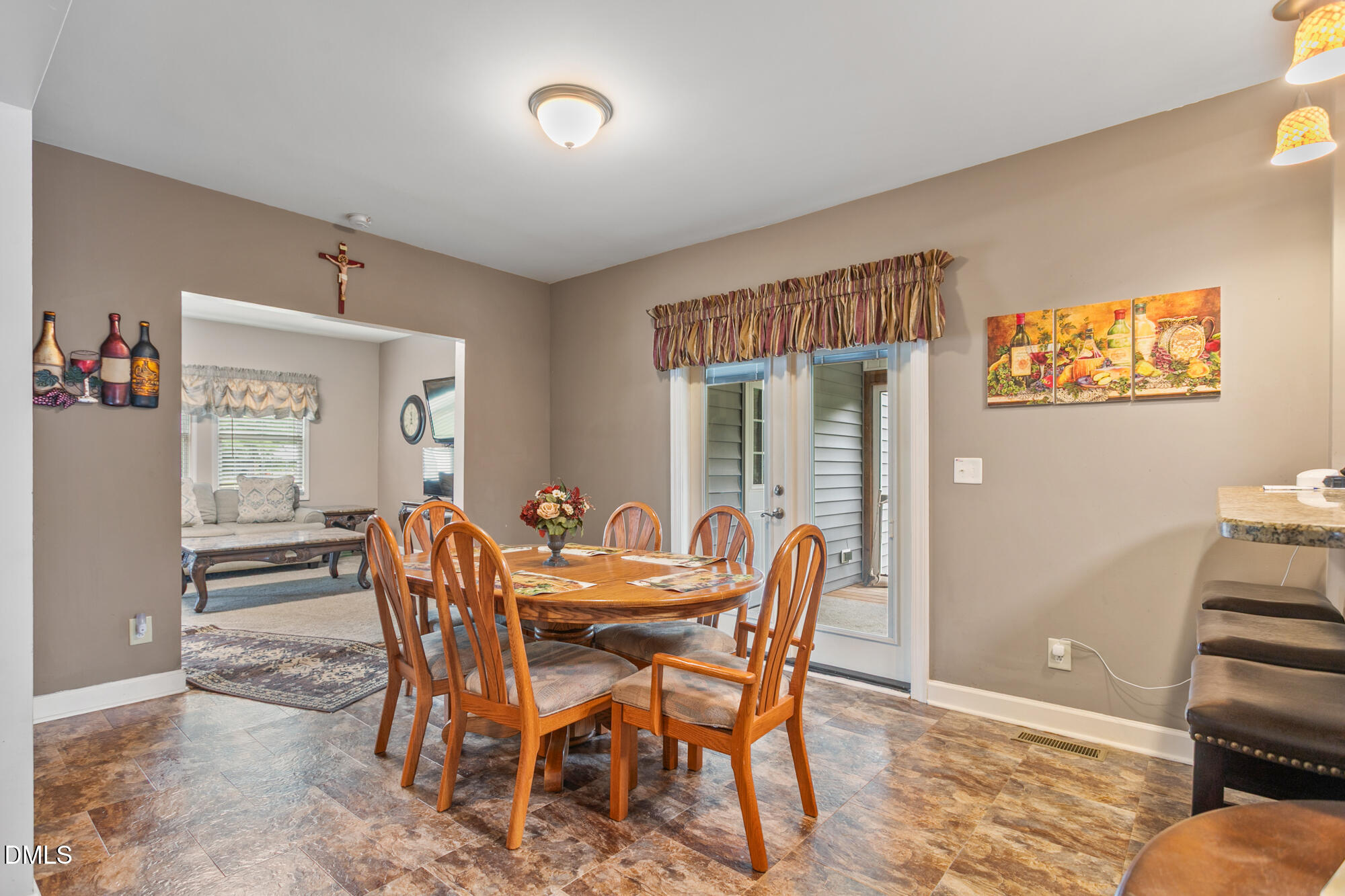 3163 Saul Loop Road Elon, NC 27244 - Photo 10 of 44 a view of a dining room with furniture