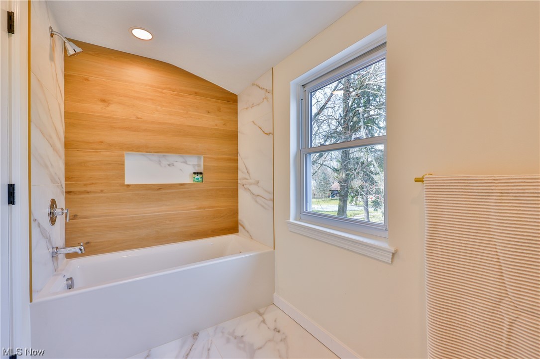 32887 Cedar Road Mayfield Heights, OH 44124 - Photo 36 of 44 Bathroom featuring plenty of natural light, vaulted ceiling, and tile flooring