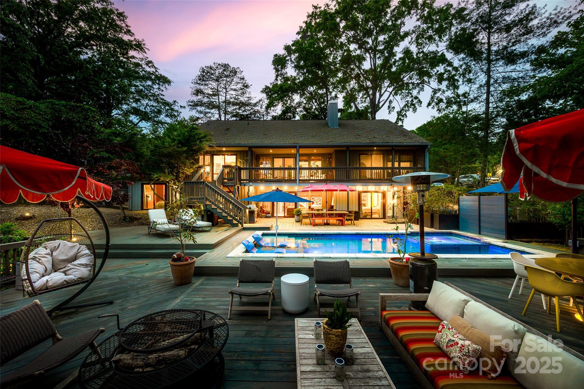 4609 Rounding Run Road Charlotte, NC 28277 - Photo 42 of 48 a view of a patio with table and chairs with wooden floor and fence