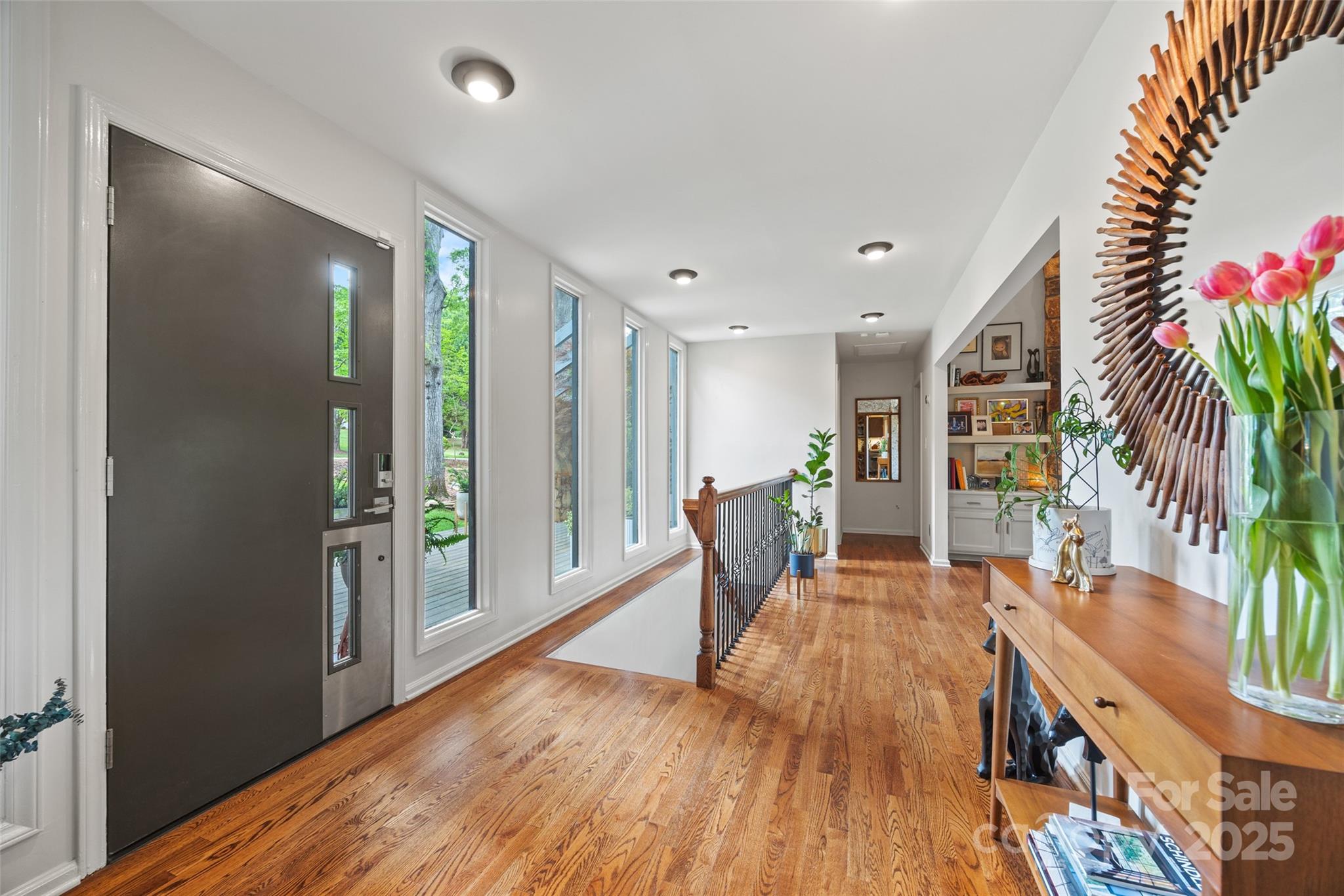 4609 Rounding Run Road Charlotte, NC 28277 - Photo 5 of 48 a living room with furniture and a potted plant