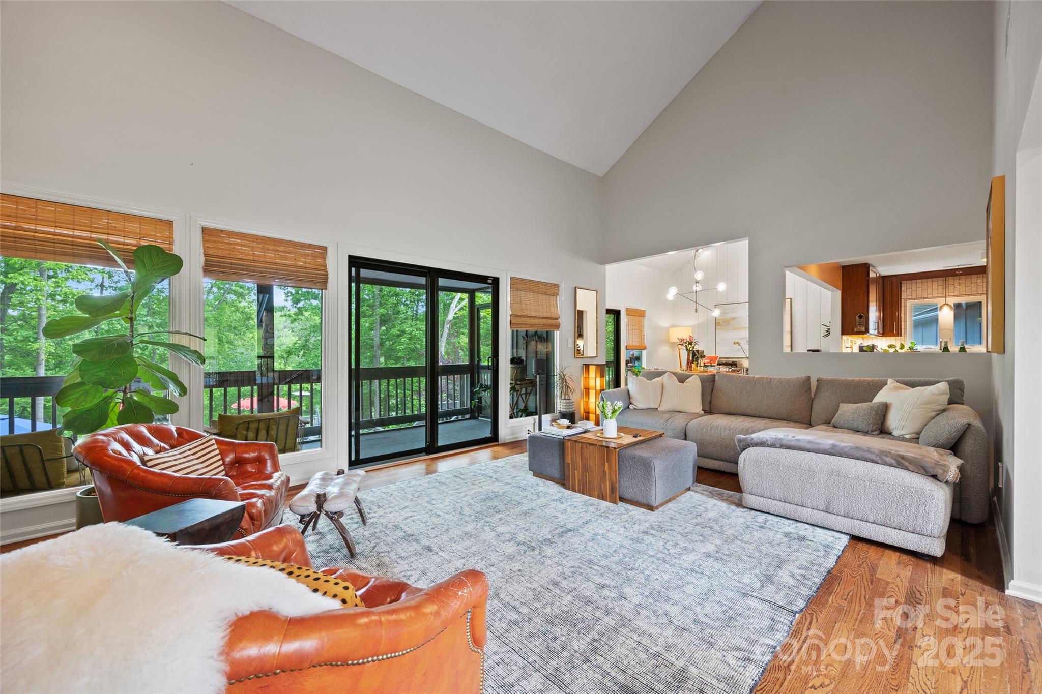 4609 Rounding Run Road Charlotte, NC 28277 - Photo 6 of 48 a living room with furniture and floor to ceiling windows