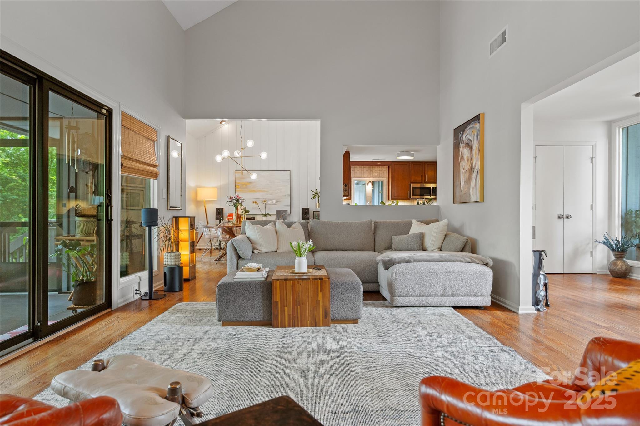 4609 Rounding Run Road Charlotte, NC 28277 - Photo 9 of 48 a living room with furniture and a large window