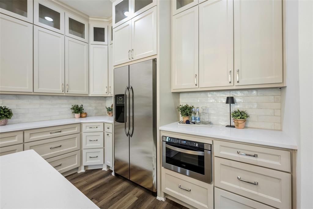 424 Private Road 5440 Point, TX 75472 - Photo 12 of 32 a kitchen with appliances cabinets and a counter top space