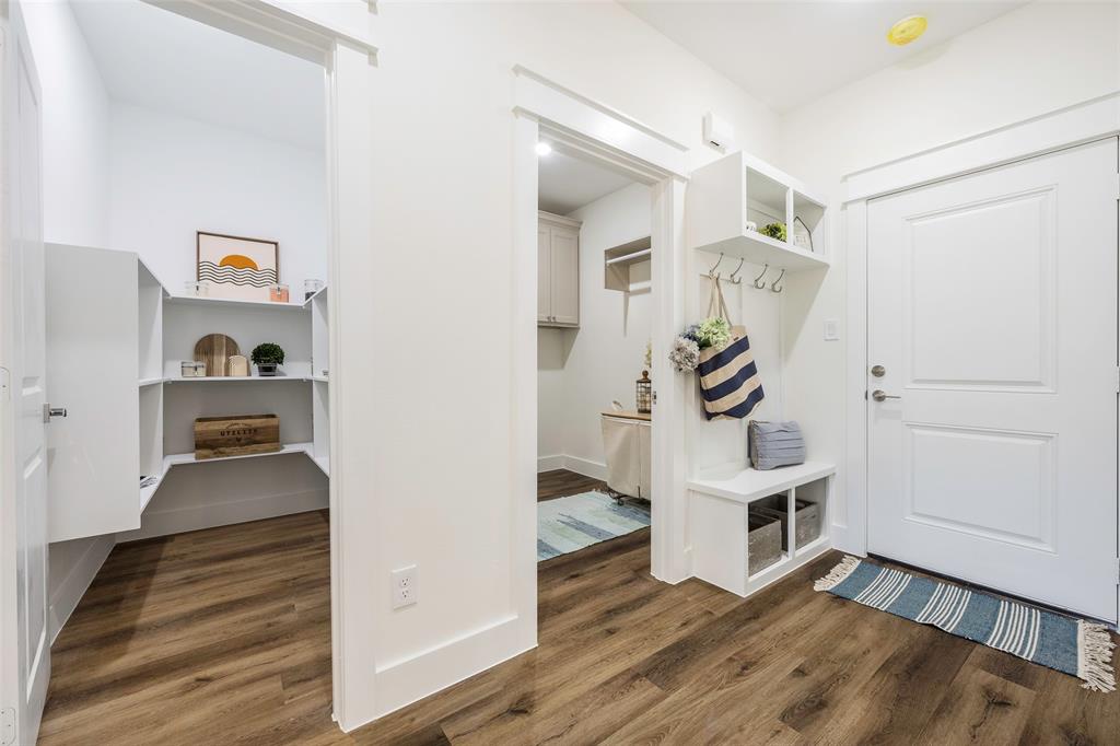 424 Private Road 5440 Point, TX 75472 - Photo 16 of 32 a view of a livingroom with wooden floor and white cabinet