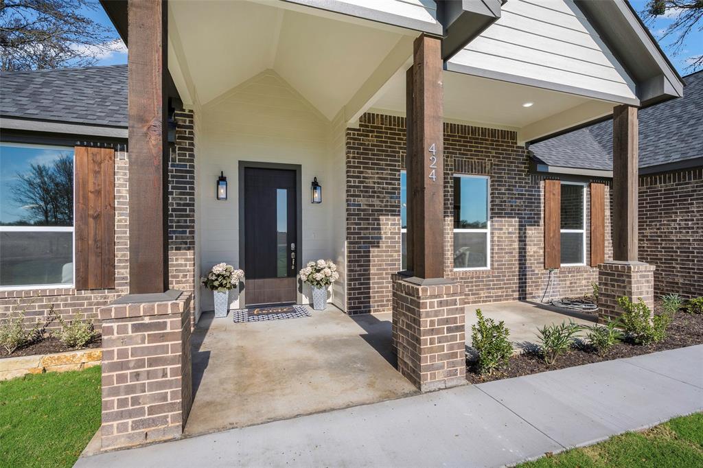 424 Private Road 5440 Point, TX 75472 - Photo 2 of 32 front view of house with a bench