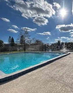 a view of a garden and lake