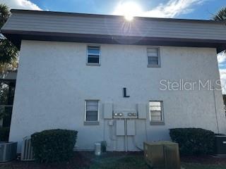 92 Windtree Lane, Unit 201 Winter Garden, FL 34787 - Photo 16 of 17 a view of storage and utility room