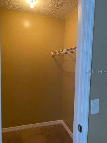 a view of small space with racks on the wall