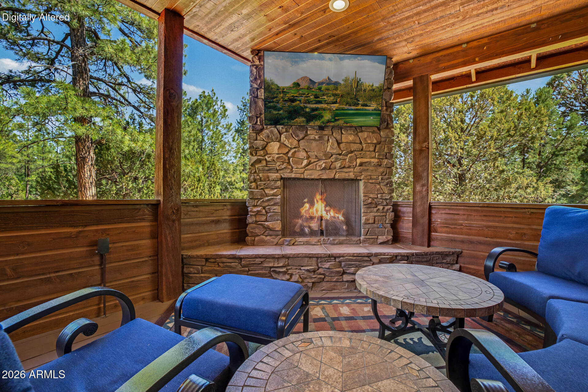1681 South Jimson Loop Show Low, AZ 85901 - Photo 81 of 105 a backyard of a house with fire pit and outdoor seating