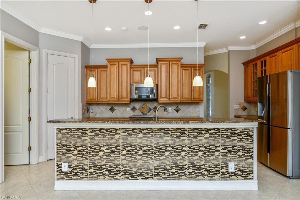 4430 Pine Ridge Road Naples, FL 34119 - Photo 11 of 35 a bathroom with a bathtub and a shower
