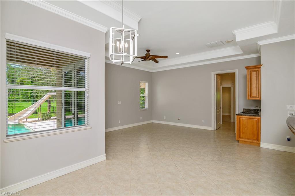4430 Pine Ridge Road Naples, FL 34119 - Photo 17 of 35 a view of livingroom with furniture and window