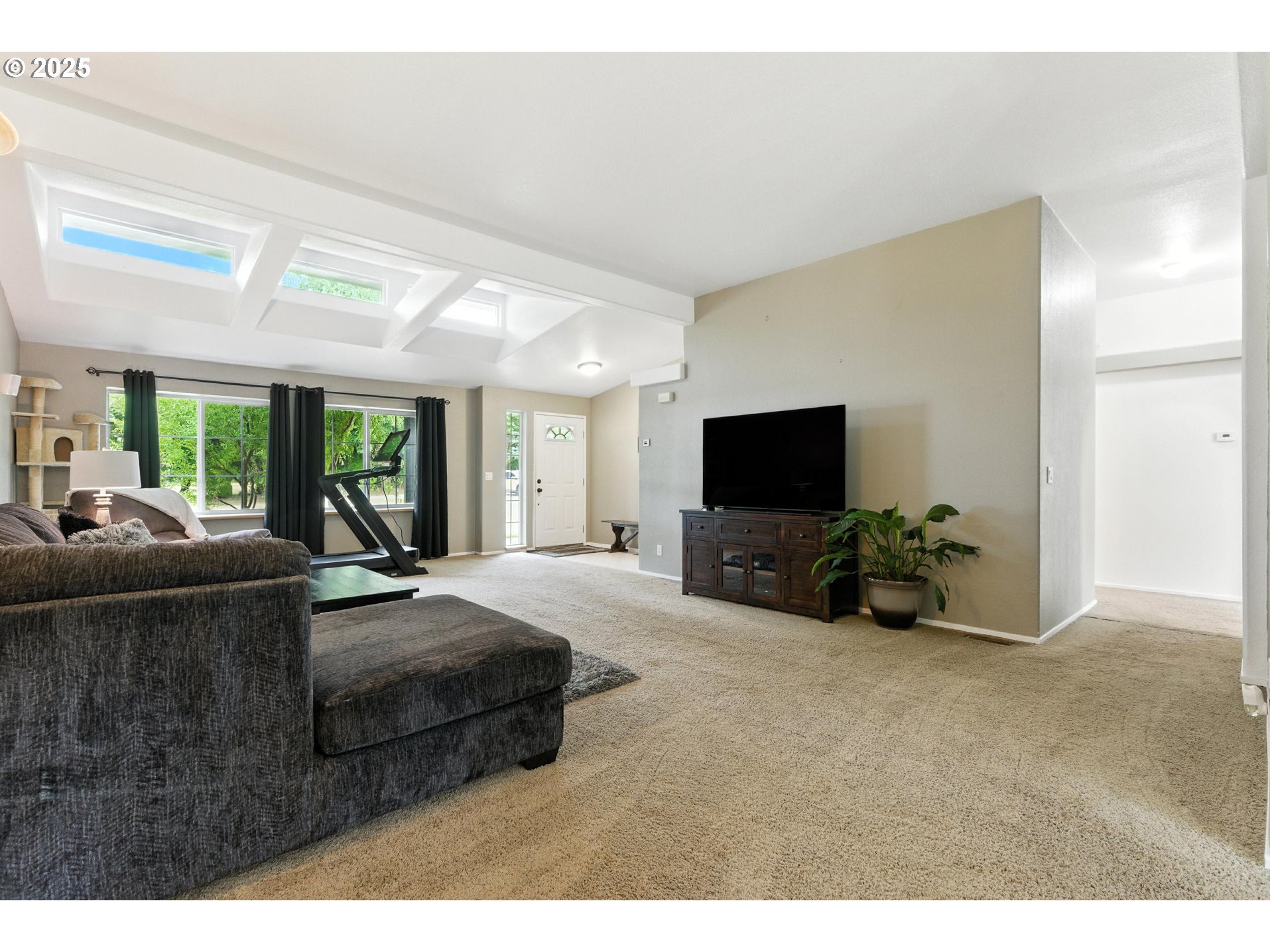20160 Southeast Foster Road Damascus, OR 97089 - Photo 17 of 48 a living room with furniture and a flat screen tv