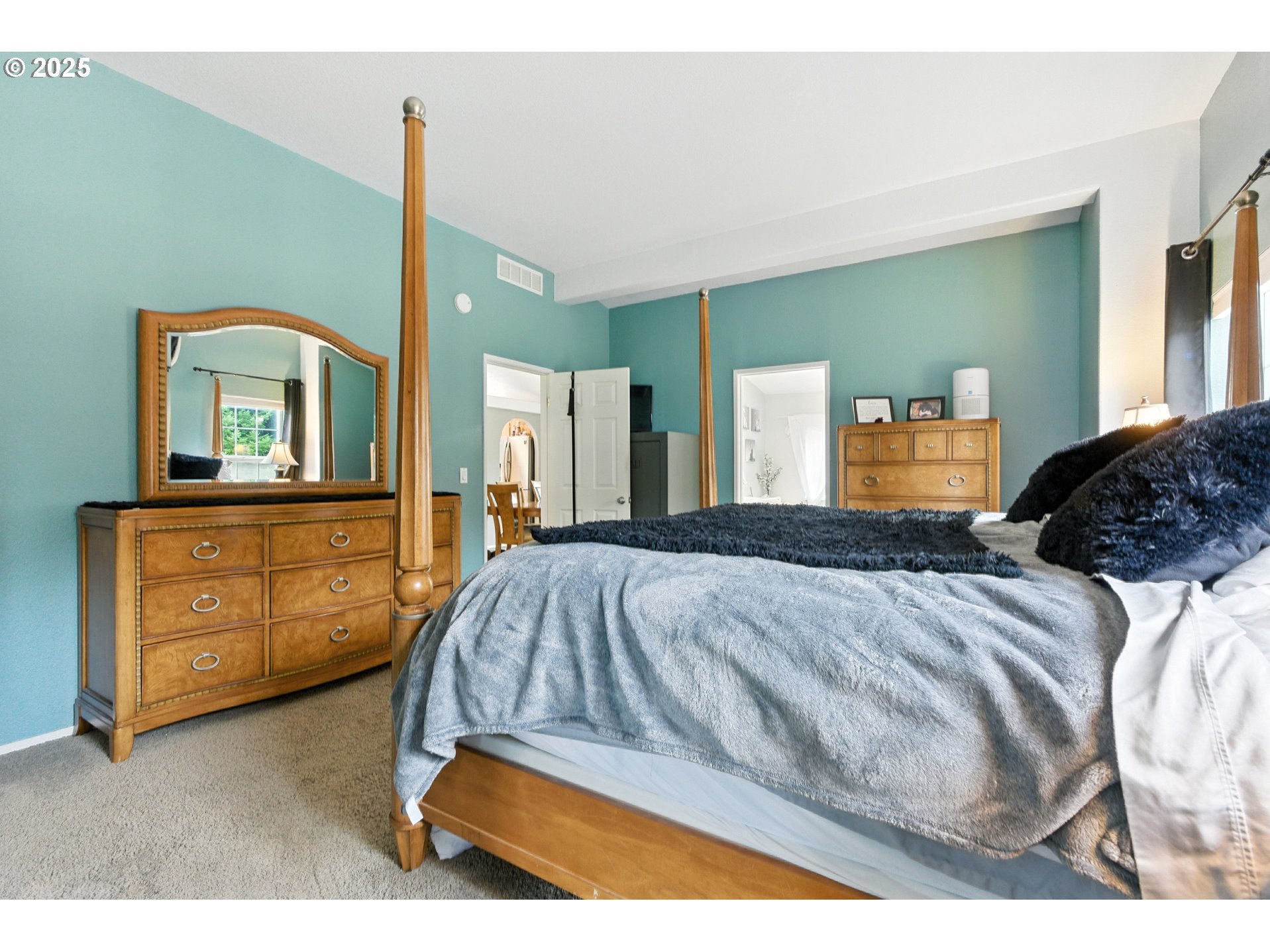 20160 Southeast Foster Road Damascus, OR 97089 - Photo 24 of 48 a bedroom with a bed and a dresser